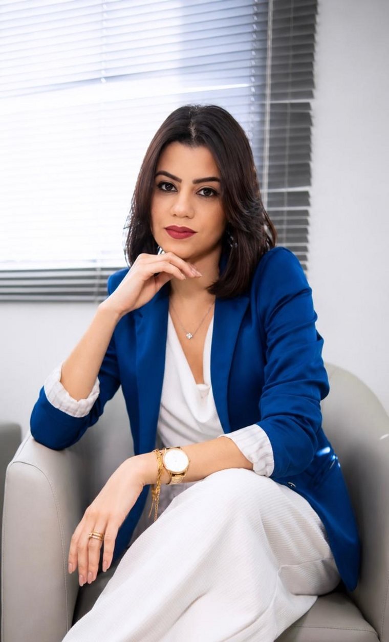 Kathleen, secretária da Clínica Viva Melhor